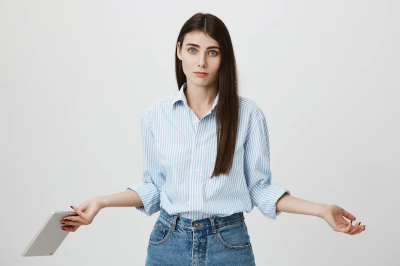 confused-indecisive-woman-shrugging-holding-digital-tablet.jpg